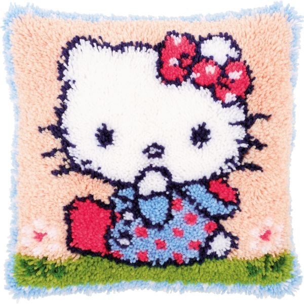 Smyrna knoopkussen Hello Kitty op het Gras
